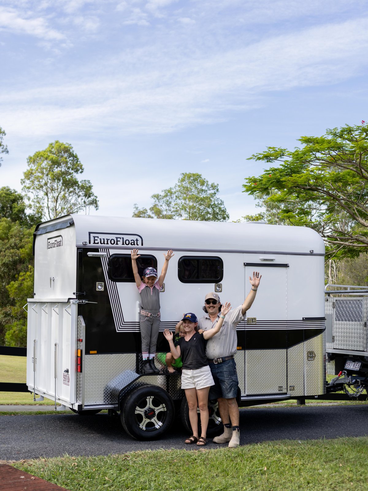 Family waving from their new EuroFloat horse float